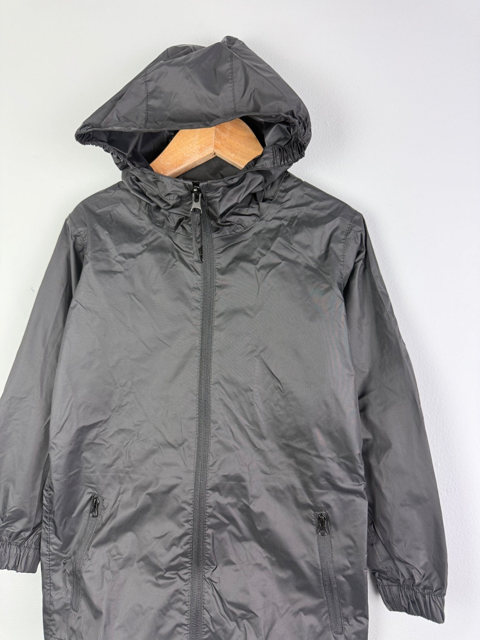 Ex Regatta Black Navy Packaway Rain Jacket - Unisex 2 - 13 Years - Discounted high street clothing for children, ladies and men including everyday wear and seasonal styles. UK online