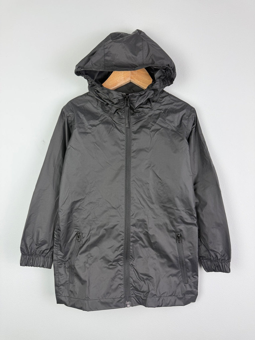 Ex Regatta Black Navy Packaway Rain Jacket - Unisex 2 - 13 Years - Discounted high street clothing for children, ladies and men including everyday wear and seasonal styles. UK online