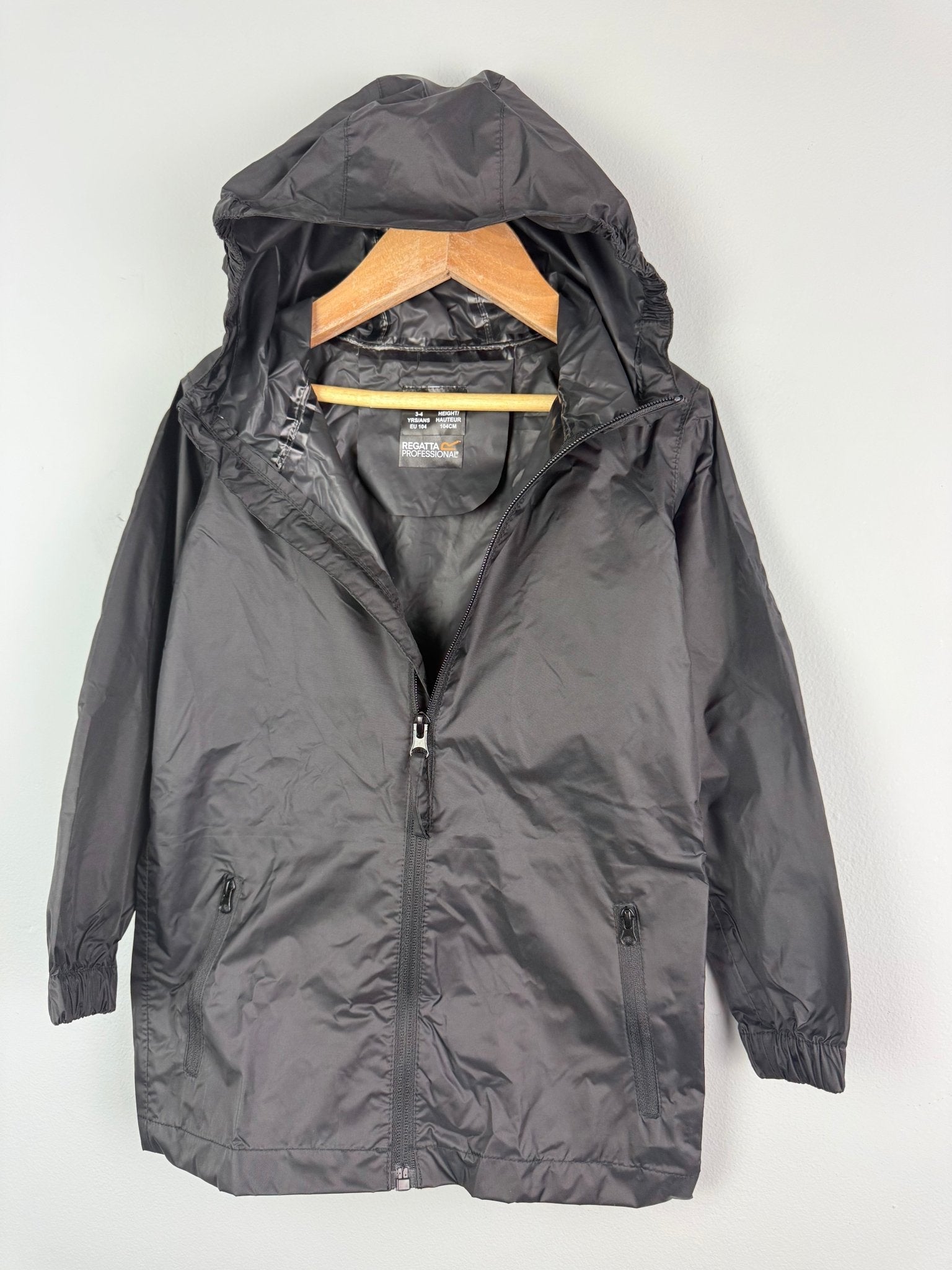 Ex Regatta Black Navy Packaway Rain Jacket - Unisex 2 - 13 Years - Discounted high street clothing for children, ladies and men including everyday wear and seasonal styles. UK online
