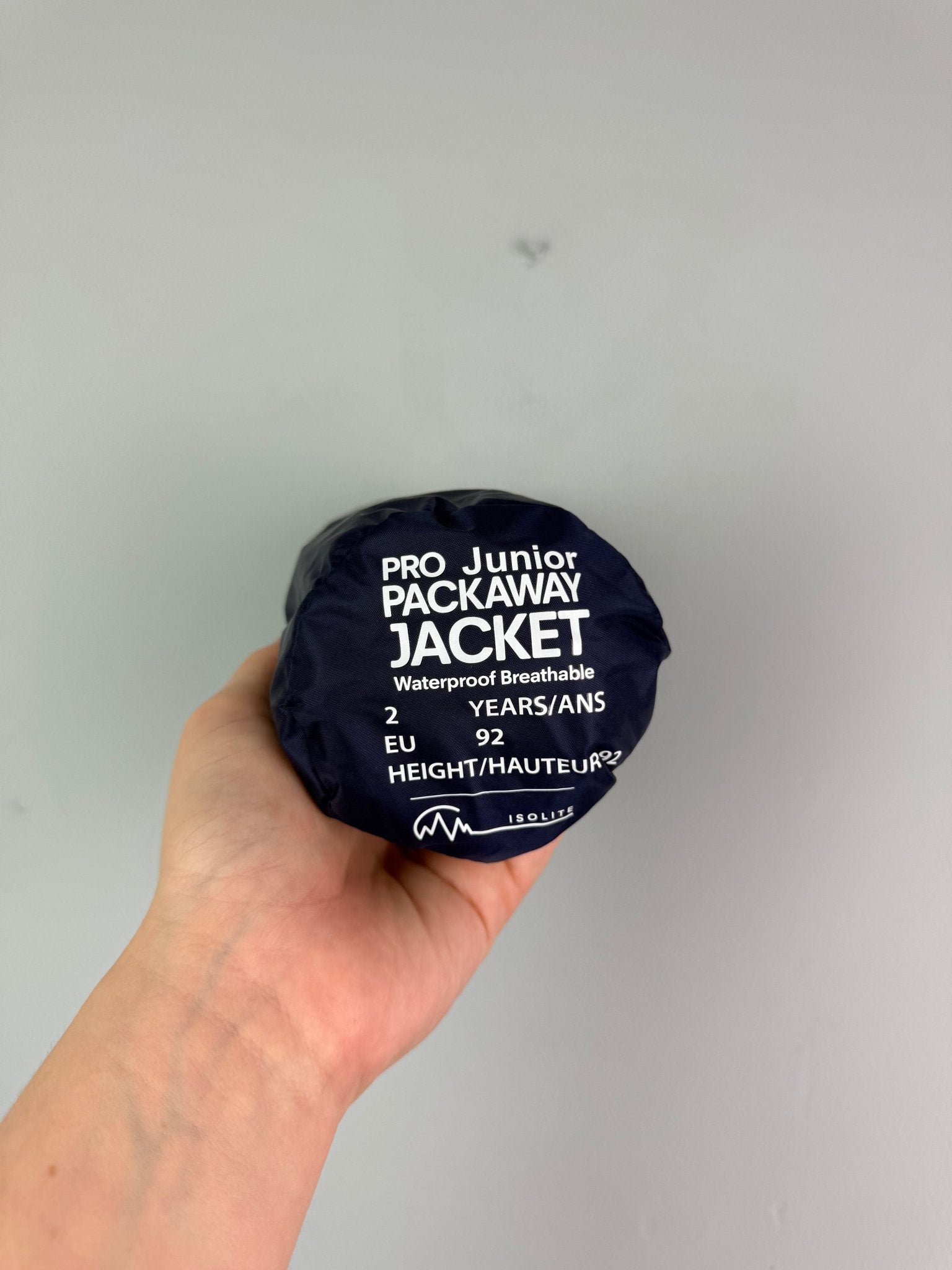 Ex Regatta Black Navy Packaway Rain Jacket - Unisex 2 - 13 Years - Discounted high street clothing for children, ladies and men including everyday wear and seasonal styles. UK online