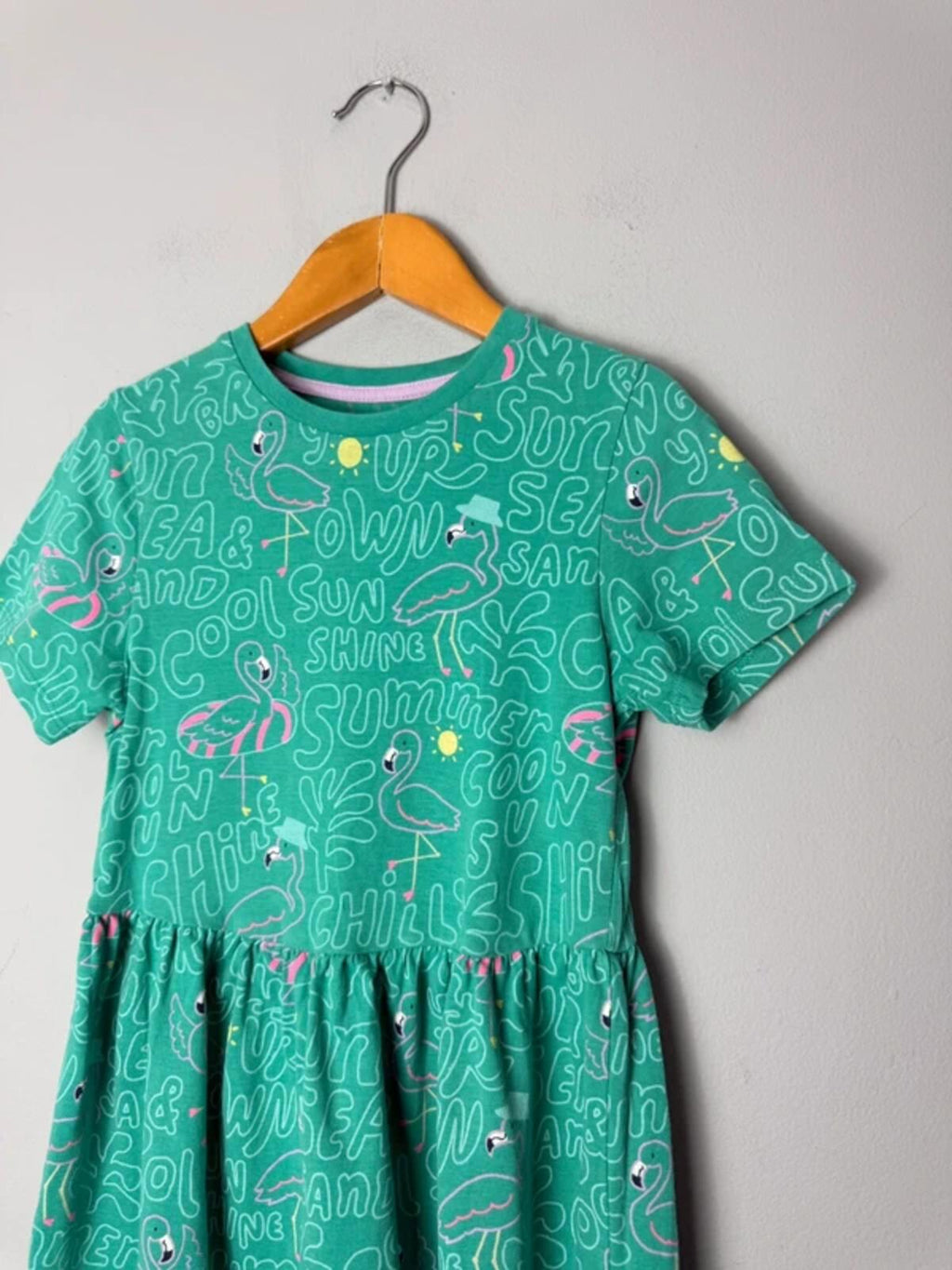 M&S Green Flamingo Summer Short Sleeve Dress - Girls 6 - 7 Years 122cm - Discounted high street clothing for children, ladies and men including everyday wear and seasonal styles. UK online