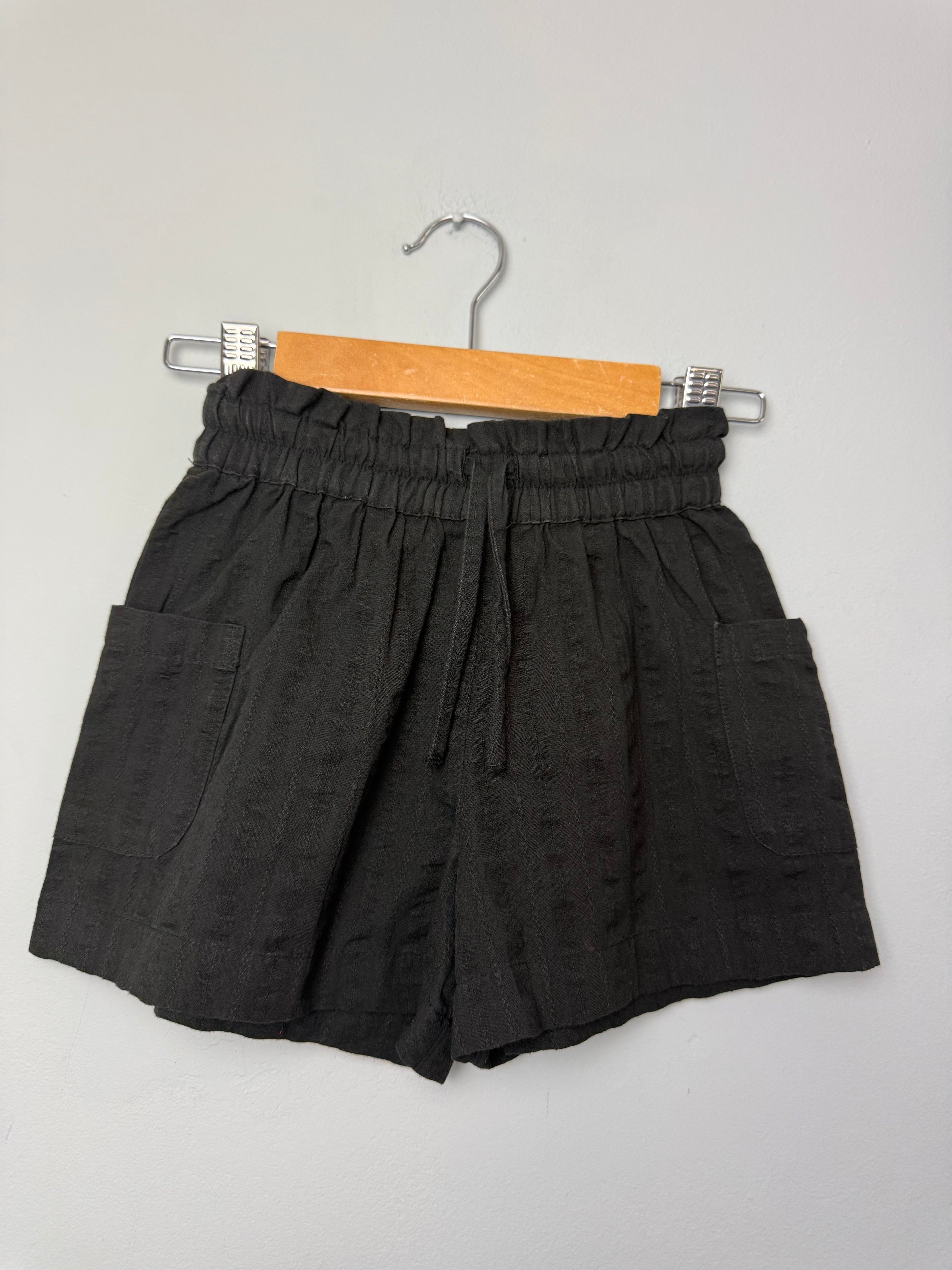 Next Black Ruffle Waist Shorts - Girls 4 Years - Discounted high street clothing for children, ladies and men including everyday wear and seasonal styles. UK online