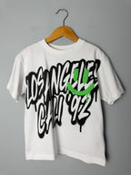 NEXT White Black Green Los Angeles Cali 92 Graffiti Short Sleeve Top - Boys 4 Years - Discounted high street clothing for children, ladies and men including everyday wear and seasonal styles. UK online