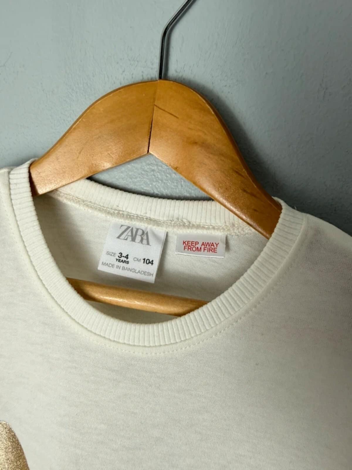Zara Cream & Gold Cheetah Long Sleeve Top - Girls 3 - 4 Years - Discounted high street clothing for children, ladies and men including everyday wear and seasonal styles. UK online